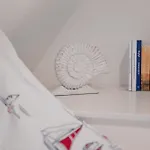 Ku
