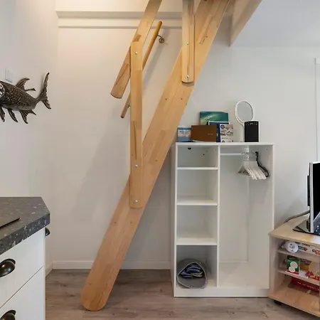 Ku